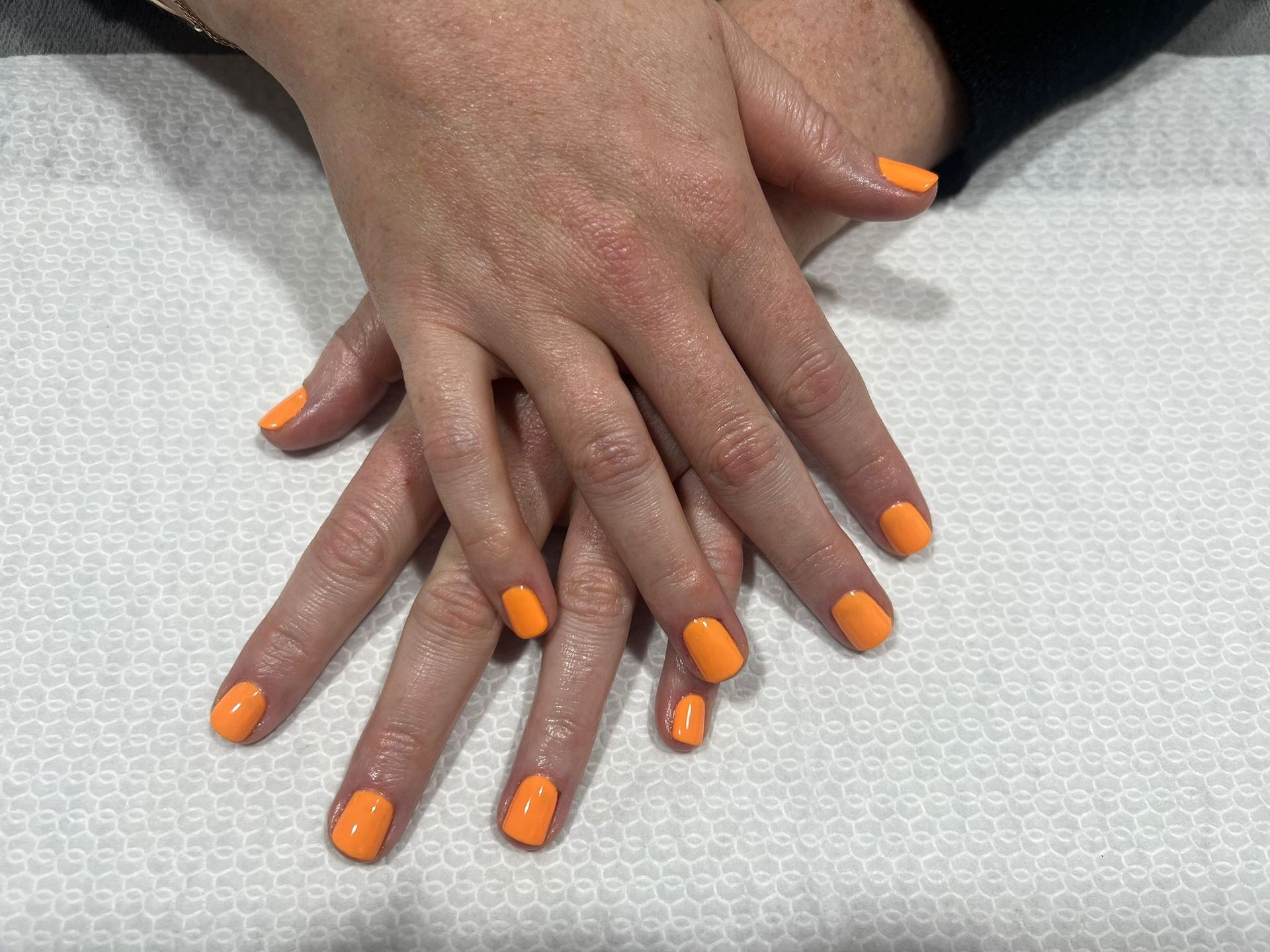 Nikee's Beauty Bar Orange Manicure